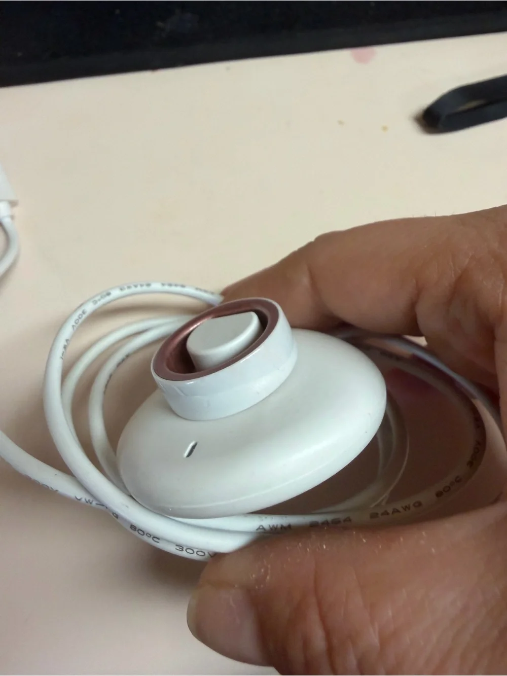 White Smart Wearable Ring Charger Dock with Rose Gold Accent